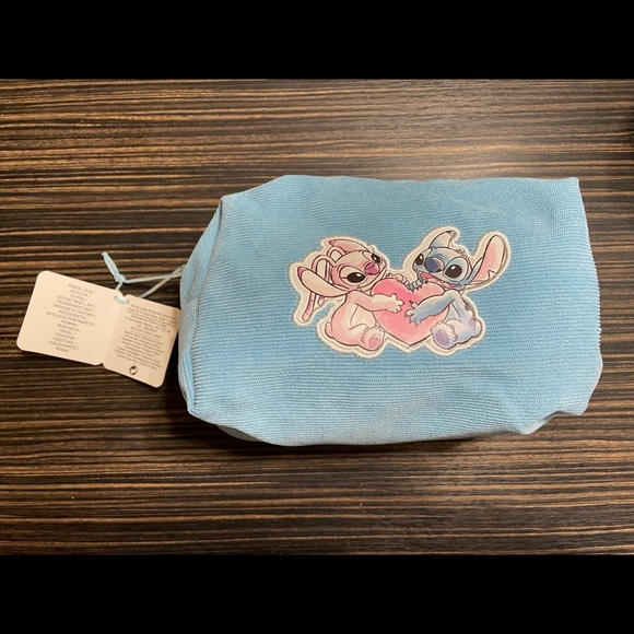 Disney Handbags - NWT Disney Lilo & Stitch makeup bag / pencil case